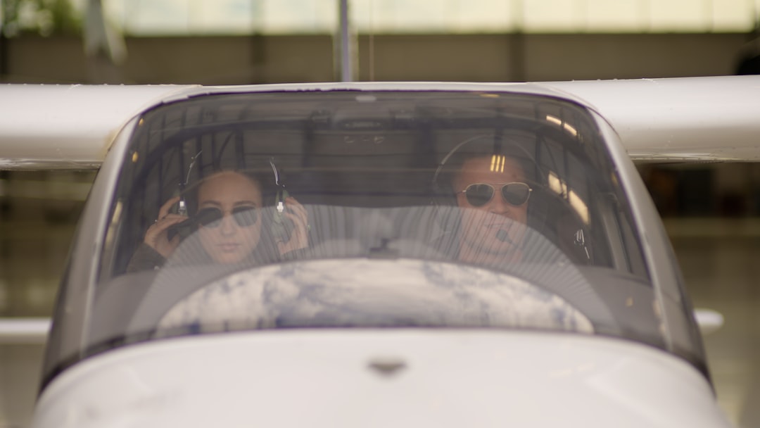 Pilot and instructor in a light aircraft cockpit