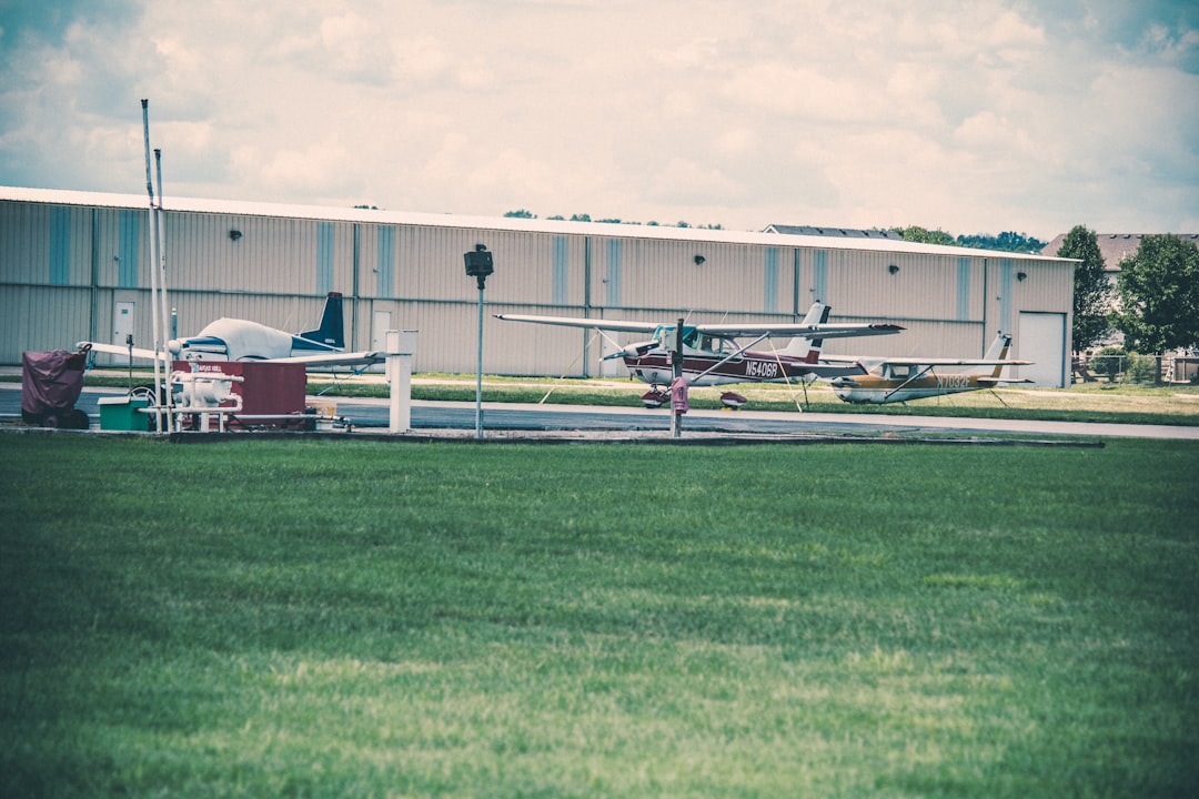 Light aircraft parked at a small airfield